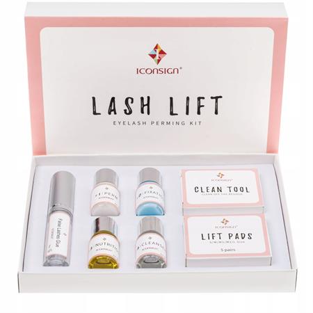 Open the Fashiongirl Lash Lift Kit by IconSign to find bottles, a tube, tools, and lift pads neatly arranged. Get salon-quality eyelash perm treatment from home. The box lid reads: Lash Lift Eyelash Perming Kit.