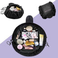 Sminkresväska – Magic Travel Pouch i svart – | Fashiongirl