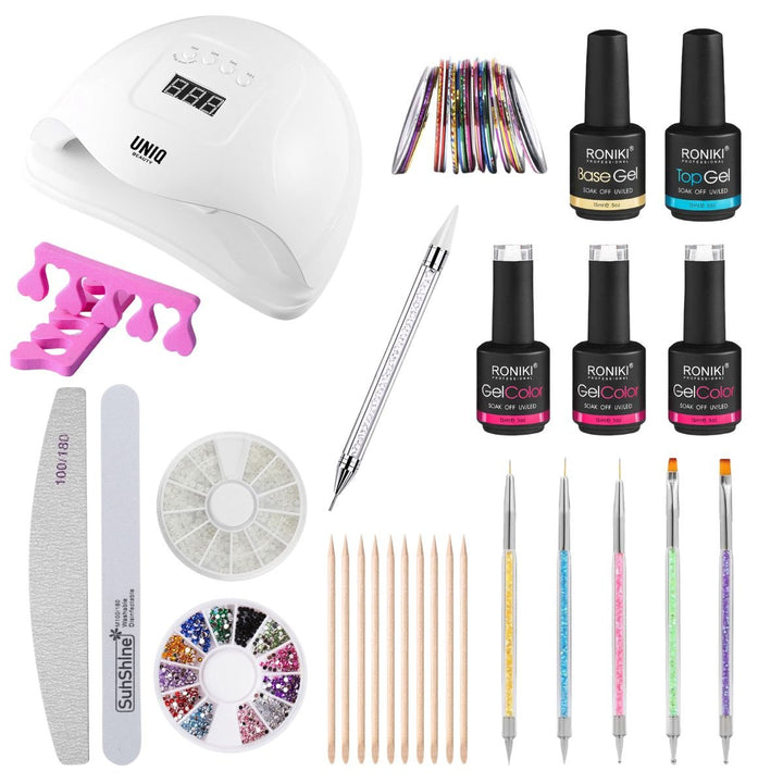 The UNIQ Nail Starter Kit features an 80W UV/LED dryer, gel polishes, nail files, dotting tools, rhinestones, wooden sticks, separators, and colorful nail art brushes—perfect for flawless gel nails by UNIQ.