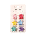 SOHO Lala Mini Hair Claws - Flowers by SOHO innehåller sex färgglada miniklämmor (rosa, röda, gula, blå, turkosa, lila) på ett vitt kort med en söt kattansikteillustration.