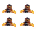 Fyra SOHO Mini Tortoise Hair Claws från SOHO, var och en med en metallfjäder, är arrangerade i ett 2x2-rutnät på en vit bakgrund – perfekt för att skapa en naturlig look.