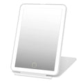UNIQ Foldable LED Makeup Mirror från UNIQ har en vit ram, inbyggd ljusram, cirkulär touchknapp och hopfällbart stöd. Den är uppladdningsbar och resevänlig, vilket gör den till den perfekta skönhetskompisen när du är på språng.