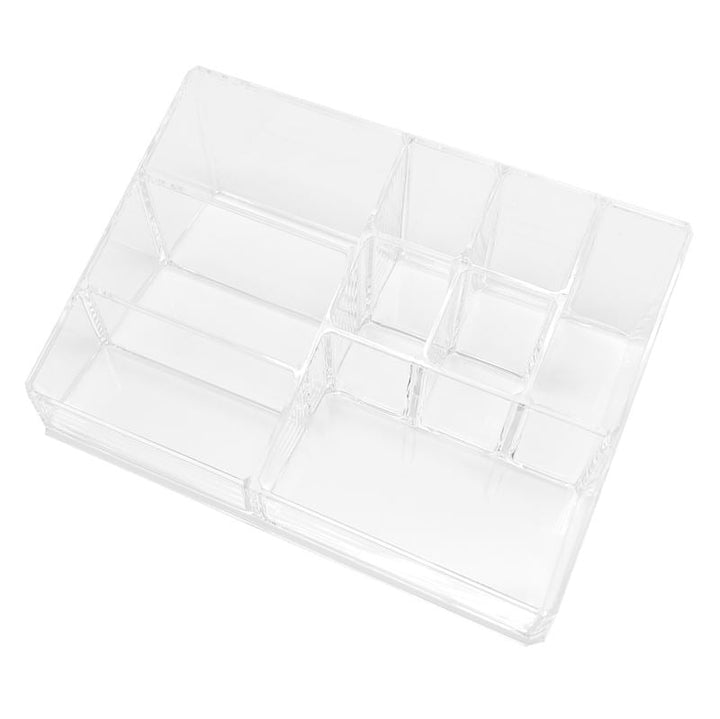 The UNIQ Make Up Acrylic Organiser - SF-1611D (U304) by UNIQ features nine clear compartments in various sizes—ideal for sorting accessories or makeup—and is shown from above on a white background.